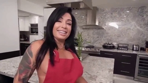 Massage in the kitchen amongst passionate brunette